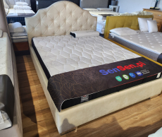 Łóżko tapicerowane w kolorze beżowym160x200 cm z pojemnikiem na pościel